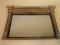 A William IV giltwood and gesso rectangular wall mirror with an inverted