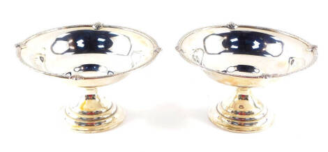 A pair of George V silver sweet meat dishes, of ogee pedestal form, Adie Bros, Birmingham 1924, 5.92oz.