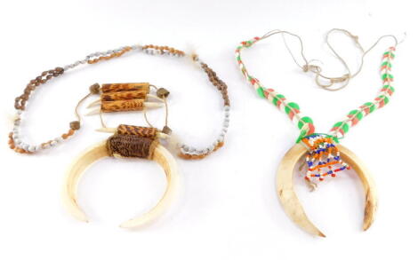 Two Papua New Guinea tribal necklaces, made from horn, bone, shells and beads.