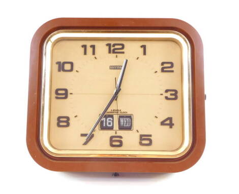 A Rhythm brown plastic cased 1970's transistor clock, rectangular gilt dial bearing Arabic numerals, centre seconds, date aperture, 33.5cm high, 37.5cm wide.