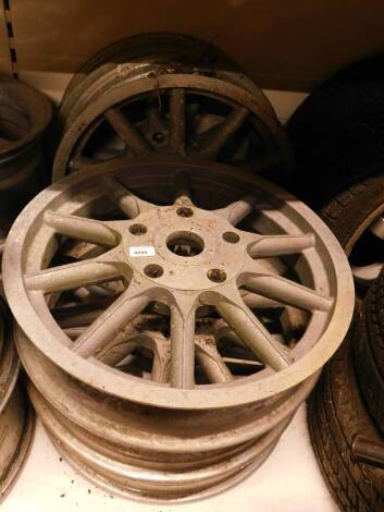 Six unnamed alloy wheels, ten spoke, 19" diameter.