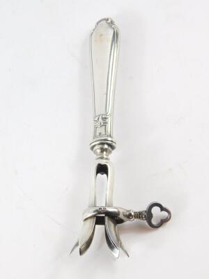 A late 19thC French silver plated ham hock brace or bone grip, by The Manufacture de L'Alfenide, goat's head mark, 21.5cm long. - 2