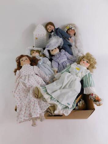 Assorted collectors dolls, dressed in Victorian costume, with stands. (a quantity)