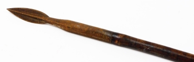 Three various African tribal spears, to include one with an elaborate arrowhead top with turned metal handle and wooden turned centre section with plain banding, 74cm high, and two others. (3) - 6