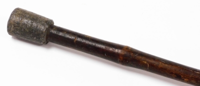 Three various African tribal spears, to include one with an elaborate arrowhead top with turned metal handle and wooden turned centre section with plain banding, 74cm high, and two others. (3) - 7
