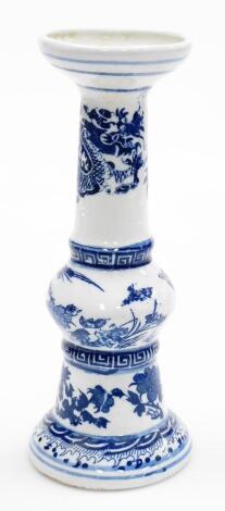 A Chinese blue and white porcelain gu vase, decorated with bands of dragons, birds and foliage between bands of key fret designs and waves, six character Guangxu mark beneath. 20thC, 25cm high.