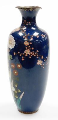 A Meiji period Japanese cloisonne baluster vase, decorated with flowers on a blue ground, 35cm high. (AF) - 2