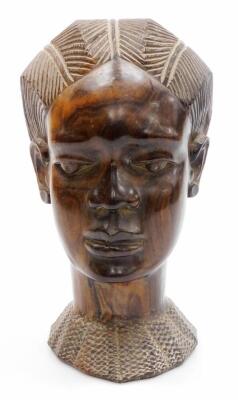 A 20thC African tribal head formed as a lady, with elaborate hair and heavily carved neckline, 24cm high.