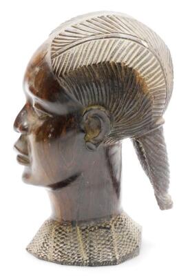 A 20thC African tribal head formed as a lady, with elaborate hair and heavily carved neckline, 24cm high. - 2