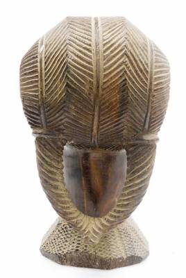 A 20thC African tribal head formed as a lady, with elaborate hair and heavily carved neckline, 24cm high. - 3