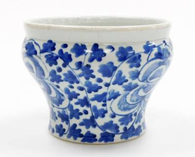 A late 19thC Chinese blue and white jardiniere, of waisted form painted with flowers and leaves, 20.5cm diameter, 15cm high. - 4