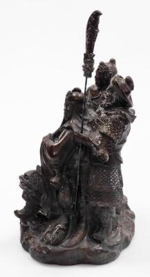 A Chinese bronzed spelter figural group, of a seated bearded general with two attendants on a rock work base, unmarked, 19thC, 37cm high. - 2