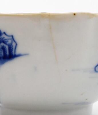 A Chinese export porcelain blue and white tea bowl, decorated with buildings, birds and trees with gilt shaped rim, 18th/19thC, 9cm wide. - 5