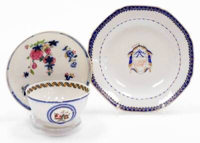 A group of 18thC and later porcelain, comprising an export monogrammed saucer, with central shield picked out in gilt, with an outer bluer border decorated with stars, 15cm wide, an export porcelain tea bowl, decorated with flowers, and an associated sauc