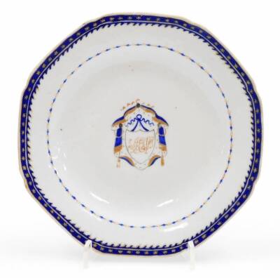 A group of 18thC and later porcelain, comprising an export monogrammed saucer, with central shield picked out in gilt, with an outer bluer border decorated with stars, 15cm wide, an export porcelain tea bowl, decorated with flowers, and an associated sauc - 2