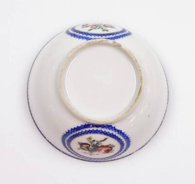 A group of 18thC and later porcelain, comprising an export monogrammed saucer, with central shield picked out in gilt, with an outer bluer border decorated with stars, 15cm wide, an export porcelain tea bowl, decorated with flowers, and an associated sauc - 9