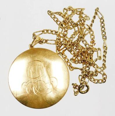 A Victorian portrait pendant and chain, the circular portrait depicting a gentleman in suit, unsigned, in a yellow metal frame bearing the initials AHL?, marked 10ct, 4cm diameter, on a gold plated chain. - 2