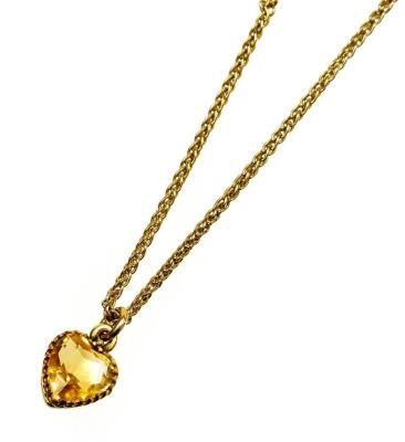 A 9ct gold citrine heart pendant and chain, the heart in yellow metal claw frame on byzantine chain, 38cm long overall, 4.3g all in.