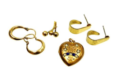 A group of earrings and other jewellery, comprising a pair of 9ct gold hoops, 1.1g, a pair of gold plated hoops, three 9ct gold studs, lacking backs, 0.4g, and a gilt metal locket, set with blue paste and seed pearls. (6)