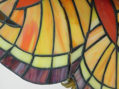 A Tiffany style fairy lamp, the figure in standing pose, with decorative glass wings, on a shaped base, 41cm high. - 2