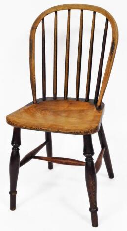 Taylor (Grantham). A 19thC hoop back chair, with plain spindles, shaped seat, ring turned front legs, and H stretcher, stamped to the seat, 89cm high.