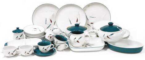 A Denby Greenwheat part dinner service, comprising two tureens, three serving dishes, five cups and saucers, two soup bowls, gravy boat, sugar bowl, butter dish, six dinner plates, five side plates and eight bread plates. (a quantity)