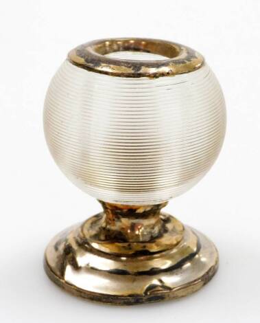 A white metal topped match striker vase, the white metal base with applied ribbed glass body and a silver plated framed top, 6cm high.