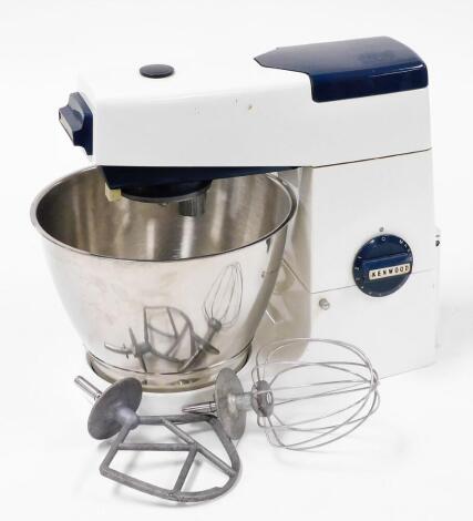 A Kenwood mixer, in white design with blue trims, including mixing bowl and two attachments.