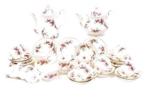 A Royal Albert Lavender Rose pattern part tea service, comprising cups and saucers, side plates, milk jug, sugar bowl, coffee pot and teapot. (1 tray)