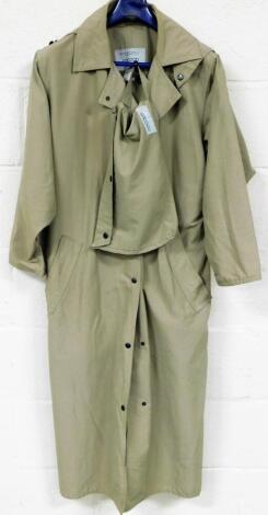 A Coccoon by McDonald Originals Ltd of Scotland ladies overcoat, 60% cotton 40% nylon, size 14, with Coccoon carry case.