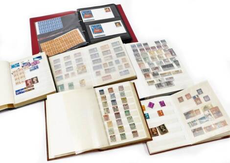 Stamps and philately. Used decimal and pre decimal stamps, World used stamps, Hong Kong examples, loose, stamps, and set of unperforated sheet stamps. (5 albums)