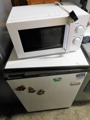 A group of electricals, comprising a Hotpoint Iced Diamond fridge, and a microwave.