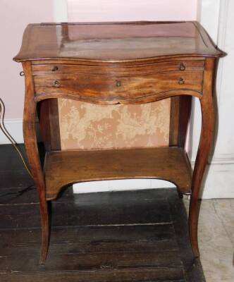 A George III mahogany fire screen writing table in the manner of John Cobb, the serpentine fronted top with a broad crossband and boxwood inlaid sides, recessed to house an adjustable fire screen, above a brush slide and a false drawer, with side drawer o - 2