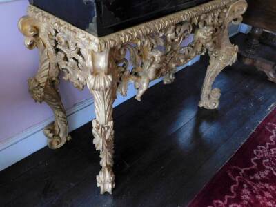 A late 17th/early 18thC Japanned cabinet, decorated in gilt and silver with flowers, buildings, etc. on a black ground, enclosing a fitted interior with an arrangement of twelve small drawers with similar decoration, embellished with birds, figures, bridg - 6