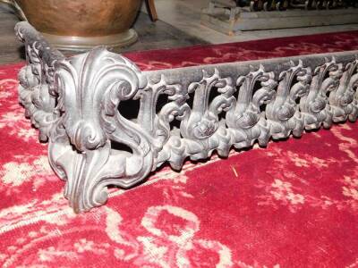 A late 19thC cast iron fire curb or fender, cast with leaves, scrolls, etc., incomplete, 120cm wide. - 2