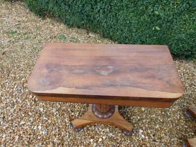 Withdrawn pre-sale by vendor. A pair of William IV rosewood card tables, rectangular top with rounded corners, on a turned lappet carved column and concave platform on lobed bun feet, 73cm high, 92cm wide, 43cm deep. - 2