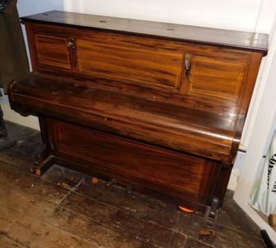 John Broadwood and Sons London. A upright piano in a rosewood case mounted with candle arms (lacking sconces), ivorine keys, etc., 106cm high, 132cm wide. - 2