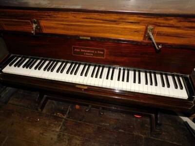 John Broadwood and Sons London. A upright piano in a rosewood case mounted with candle arms (lacking sconces), ivorine keys, etc., 106cm high, 132cm wide. - 3