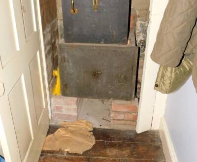 A late 19th/early 20thC safe, with brass handle and escutcheon, 50cm high, 65cm wide.