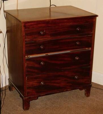 A early 19thC mahogany chest of drawers, with a plain top above four graduated drawers, each with turned wood handles, on bracket feet, 72cm high, 63cm wide, 44cm deep.