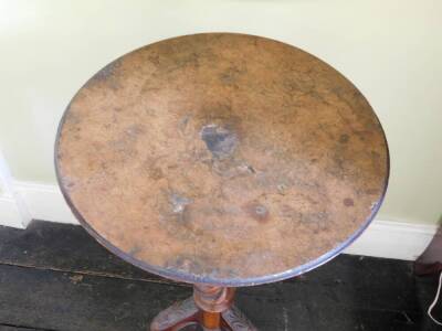 A Victorian walnut occasional table, the circular top on a spirally column and a carved tripod base, 92cm wide. (AF) - 2