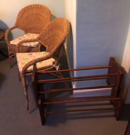 A pair of rattan conservatory type chairs and a pair of elm shoe racks. (4)