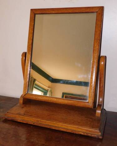 A Victorian light oak dressing table mirror, with rectangular plate, 60cm high, 53cm wide.