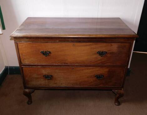 A late Victorian mahogany two drawer chest, with brass solid back plate handles and cabriole legs, 112cm wide.