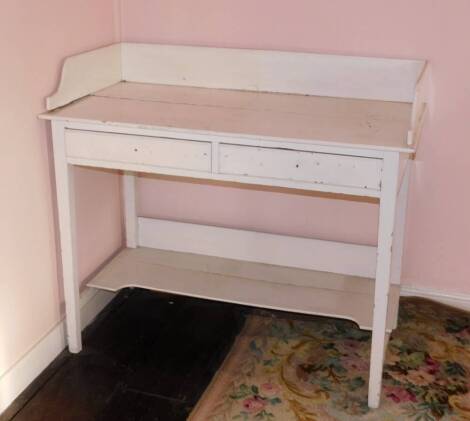 A 19thC painted tray top washstand, with two drawers, 106cm wide.