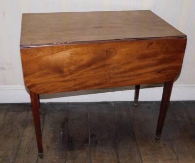 A George III mahogany Pembroke table, with frieze drawer, square tapering legs and brass castors, 80cm long.