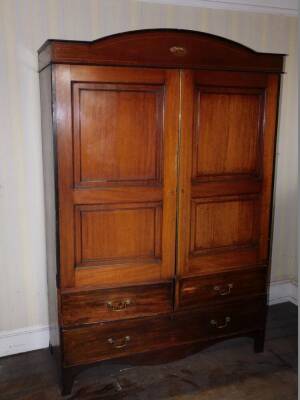 A 19thC mahogany linen press, adapted for hanging space but retaining a lower single drawer, 205cm high, 138cm wide.