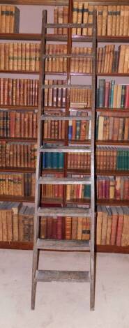 A set late 18th/early 19thC oak and elm library type steps, of plain form with nine rungs, 215cm x 41cm. (In Library)