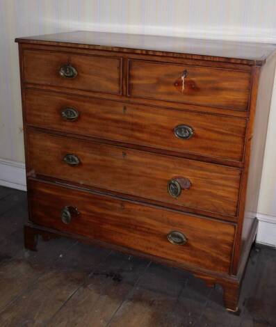 A 19thC mahogany chest, of two short and three long graduated cockbeaded drawers, with brass oval back plate handles and bracket feet, 110cm wide. (AF)