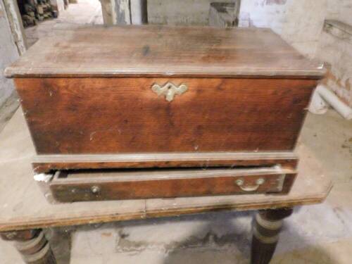 A Georgian oak bible box, with moulded lift top and drawer base, 34cm high, 64cm wide, 36cm deep. (AF)